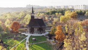 Chisinau, Moldova - circa October 2019: usual day near wooden Church of the Assumption of the Blessed Virgin Mary built in very nice place at the edge of Chisinau city
