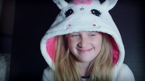 4k Shot of a Teen Girl Smiling Cute at Camera in Unicorn Hood