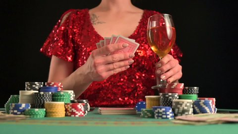 Girl, woman plays in casino, poker. Game room, chips, victory over games.