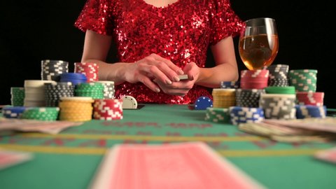 Girl, woman plays in casino, poker. Game room, chips, victory over games.