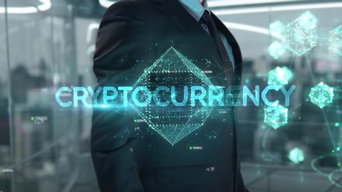 Businessman with Cryptocurrency hologram concept