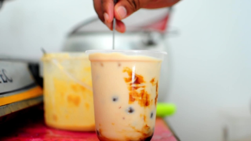 Bubble tea is a Taiwanese tea-based drink invented in Tainan and Taichung in the 1980s. Recipes contain tea of some kind, flavors of milk, and sugar topped with "pearls".