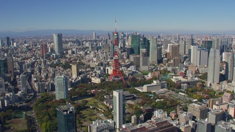 Tokyo, Japan circa-2018. Aerial view of Tokyo Tower and city of Tokyo. Shot from helicopter with RED camera.