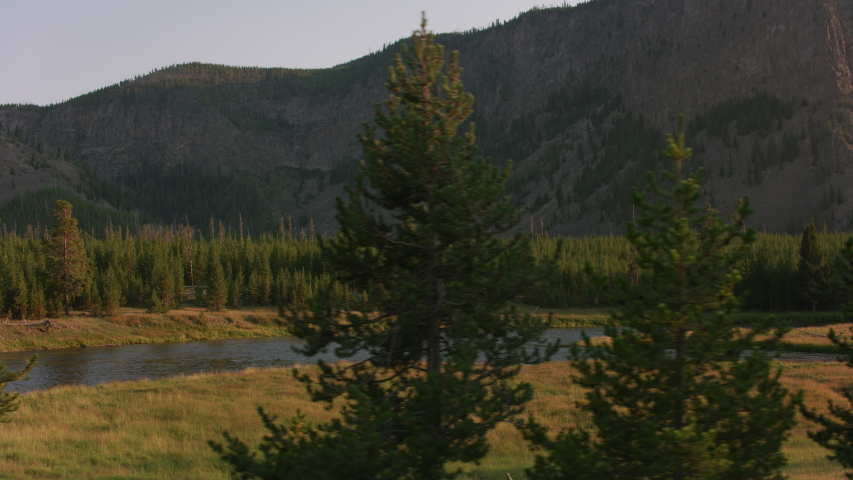 Yellowstone National Park circa-2018. Driving by beautiful scenery.