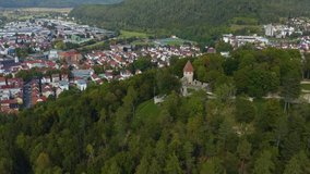 Aerial view of the city Tuttlingen. On a sunny day in summer. Zoom in on the castle.