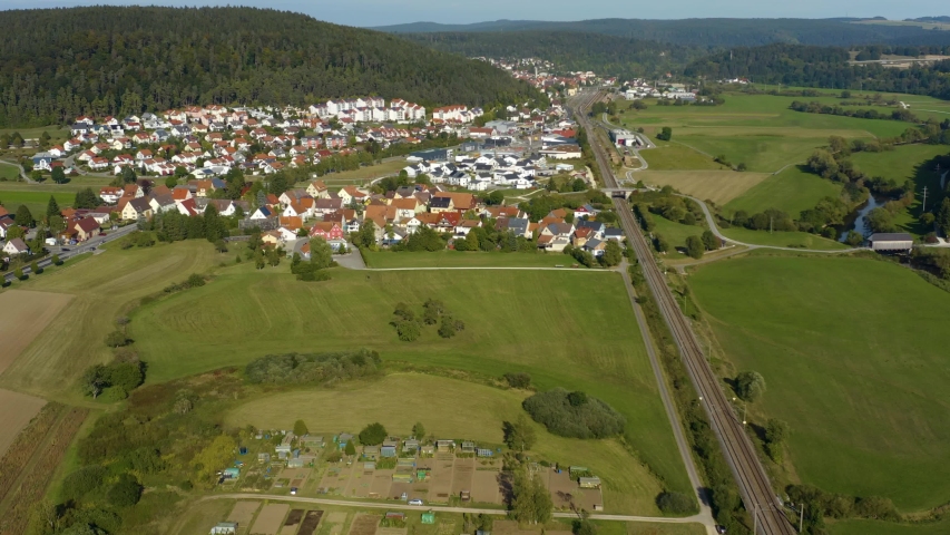Aerial view of the city Immendingen in Germany. On a sunny day in summer. Zoom in to the town.