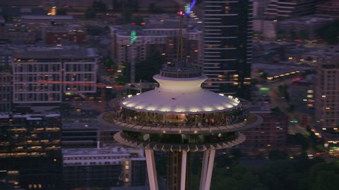 Seattle, Washington circa-2018. Aerial view of downtown Seattle, Washington at dusk. Shot from helicopter with Cineflex gimbal and RED Epic-W camera.