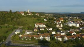 Aerial view of the city Aach in Germany. On a sunny day in summer. Ascending beside the town.
