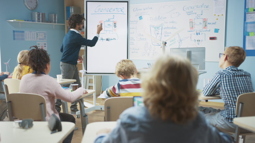 elementary school physics teacher uses interactive Stock Footage Video ...