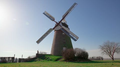 Timelapse of A Traditional Dutch Netherlands Holland Windmill Landmark on a Green Farm Hill Countryside