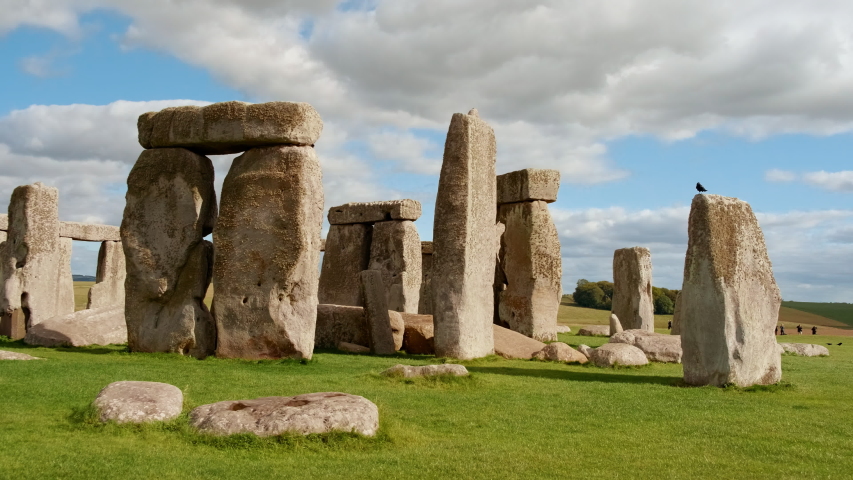 Panoramic view of Stonehenge and Wiltshire Countryside in England, UK. The stone circle dates to 3000 BC and is one of the best known ancient wonders of the world and UNESCO World Heritage Site. Royalty-Free Stock Footage #1040184260