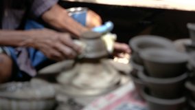 Blurry people traditional pottery molding. Pottery factory Ko Kret Nonthaburi Thailand - Powered by Shutterstock - Get 15% off with code: PIKWIZARD15