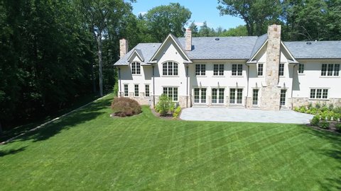 Saddlewood, NJ/United States - June 22, 2017: this videos shows beautiful views of a mansion for sale in the upscale neighborhood of Saddlewood, NJ.  