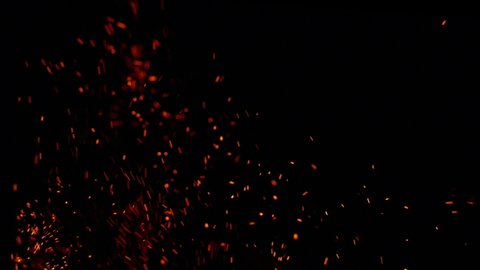 Slow motion flame with amazing flying embers. Real footage with beautiful flame detail, filmed in slow motion