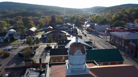 Aerial shot to left of Romney courthouse in Hampshire County, West Virginia in autumn.