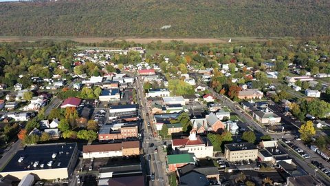 Drone orbiting around the city of Romney in Hampshire County, West Virginia in autumn.