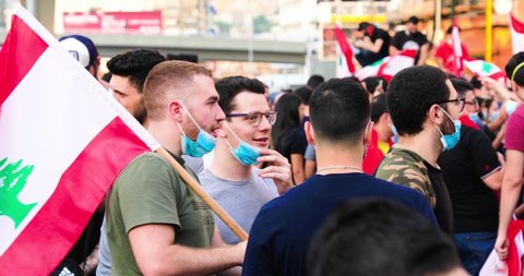 Beirut / Lebanon - 10 18 2019: Crowds of people gather on the streets in Lebanon to protest against the government