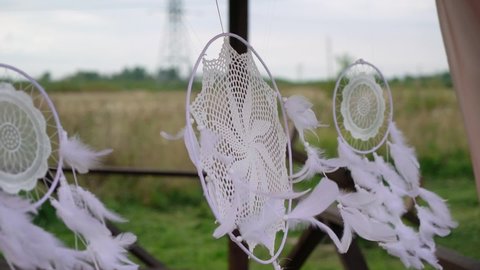 Dream catcher white outdoors at windy day Stockvideo