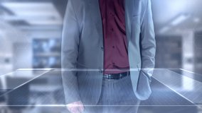 A businessman in his office works with a virtual reality panel. - Powered by Shutterstock - Get 15% off with code: PIKWIZARD15