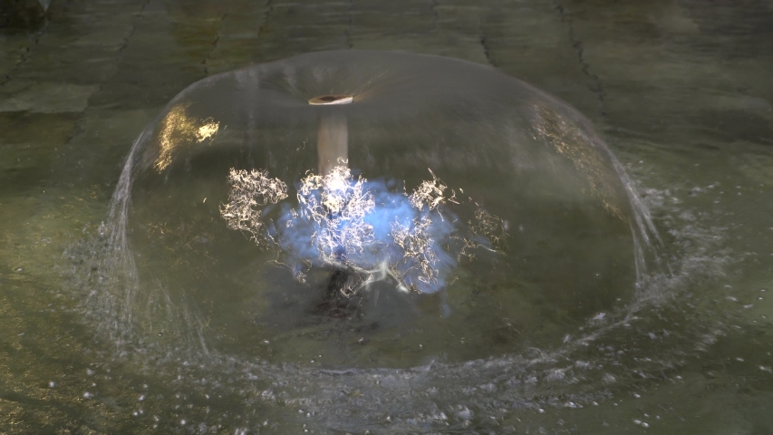 An effect on a fountain that creates a beautiful water movement. The movement of the water is like an eternal loop.