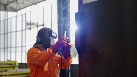  Footage welder welding pipe in workshop . Stock Video