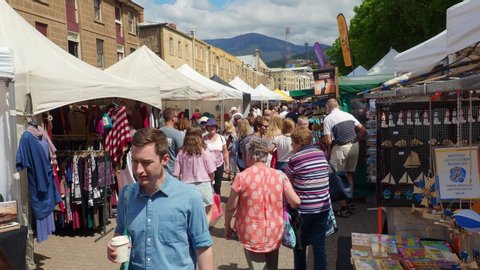 HOBART, AUSTRALIA - FEBRUARY 16, 2019: Located close to Hobart’s picturesque waterfront, Salamanca Market is located on Hobart's waterfront and is one of Australia’s largest and most vibrant markets.