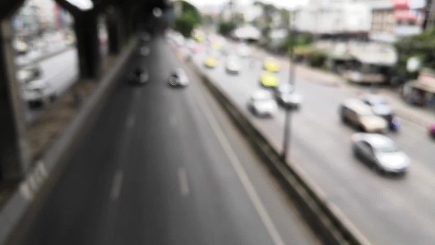 Blurr or Defocus cars on the road footage.