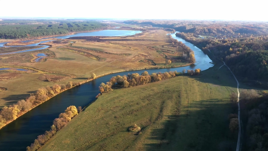 Sunny autumn day in a nature park, aerial shot