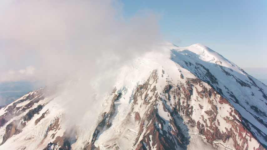 Mount Adams, Washington circa-2019. Aerial view of Mount Adams. Shot from helicopter with Cineflex gimbal and RED 8K camera.