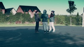 4k Outdoor Shot of Children Playing Basketball on the Field