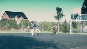 4k Outdoor Shot of Children Playing Basketball on the Field