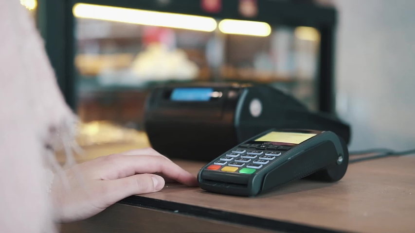 Concept contactless payment. Making payment with credit card and pos terminal, printed check. | Shutterstock HD Video #1040361938