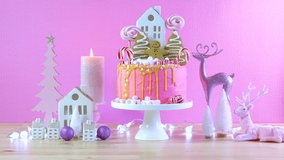 Candyland fairytale style children's party Christmas cake in pink and gold table setting. Static continuous loop cinemagraph. - Powered by Shutterstock - Get 15% off with code: PIKWIZARD15