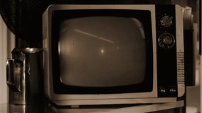 1969. Historical Footage of the Apollo 11 Launch on an Old Retro Television. Sepia Tone. Elements of this video furnished by NASA.
