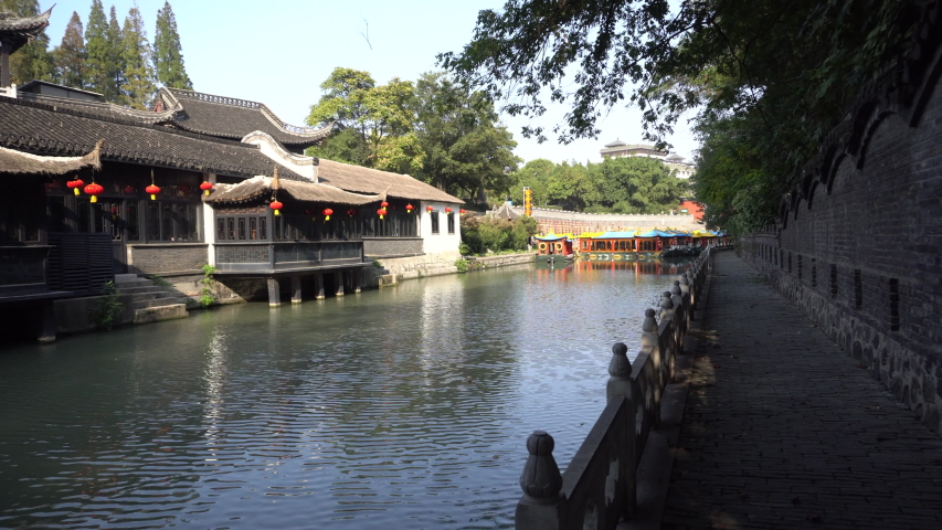Ancient Chinese garden and small canal in Yangzhou city. Yangzhou is a historic city along the route of Great canal from Beijing to Hangzhou, which is listed on UNESCO cultural heritages.