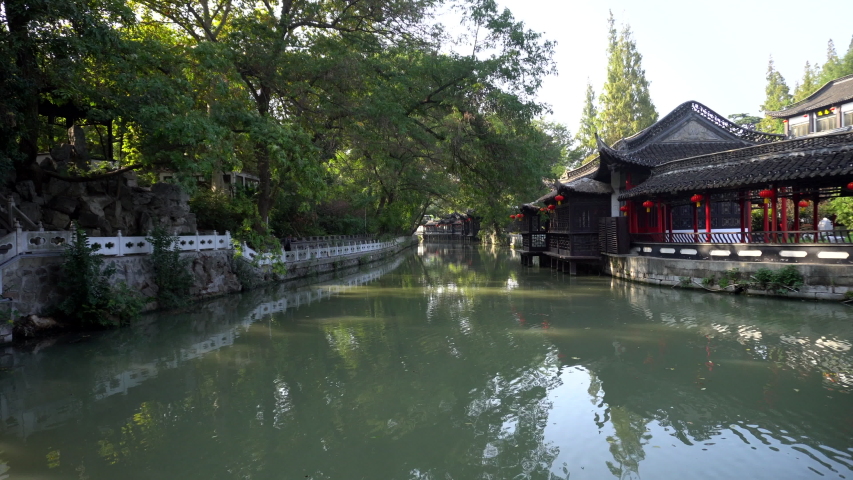 Ancient Chinese garden and small canal in Yangzhou city. Yangzhou is a historic city along the route of Great canal from Beijing to Hangzhou, which is listed on UNESCO cultural heritages.