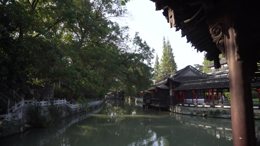 Ancient Chinese garden and small canal in Yangzhou city. Yangzhou is a historic city along the route of Great canal from Beijing to Hangzhou, which is listed on UNESCO cultural heritages.