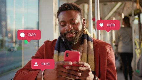 Smiling Young African American Man Use Phone Feel Happy at Sunlight in Tram Vlogger Influencer Animation With User Interface - Likes, Followers, Comments For Social Media From Smartphone Slow Motion.