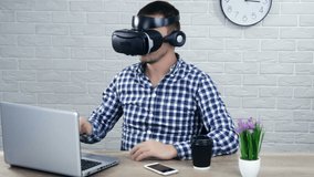 Businessman uses Virtual Realitiy VR head-mounted display