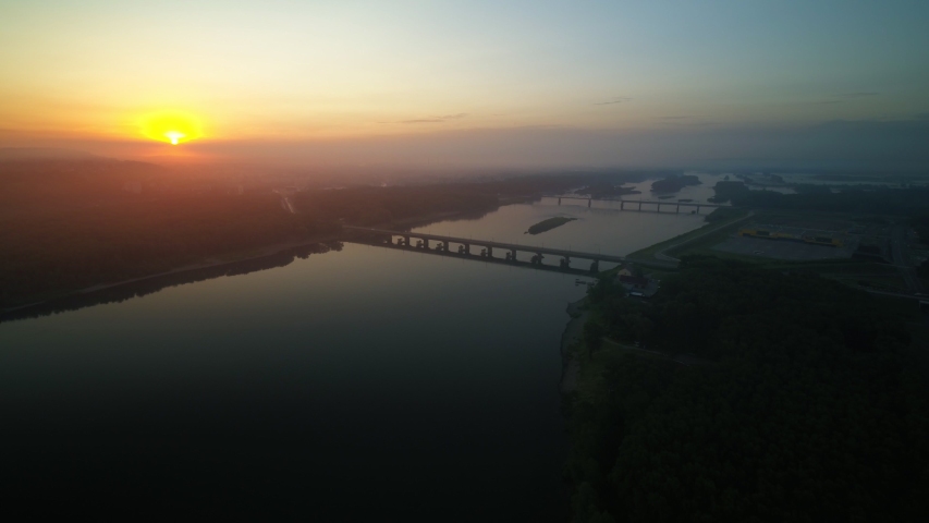 Two bridges across the river at sunset