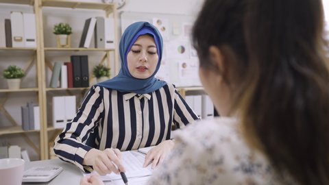 Asian Islam Woman Consultant Talking Stock Footage Video 100 Royalty Free 1069159966 Shutterstock