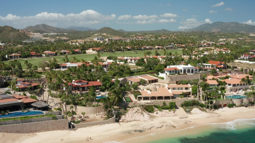 Mexico Beach Resort Area with beautiful houses and rocky beaches