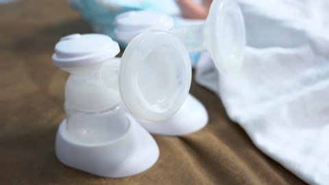Close up of Breast pump on bed for baby 