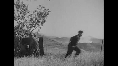CIRCA 1930s - Franco's forces use field artillery and machine guns in battling for Bilbao.