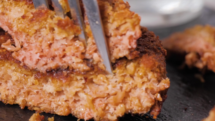 Plant based vegan burger meat, fake vegeterian beef meat close up, fresh impossible veggie food, beyond meat