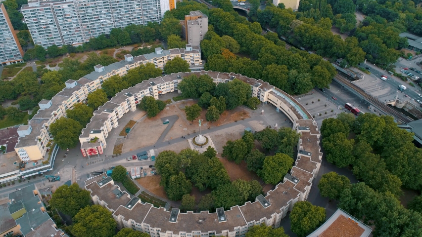 BERLIN, GERMANY - AUGUST, 2019: Aerial view of the city suburbs architecture. Living residential houses and business buildings.