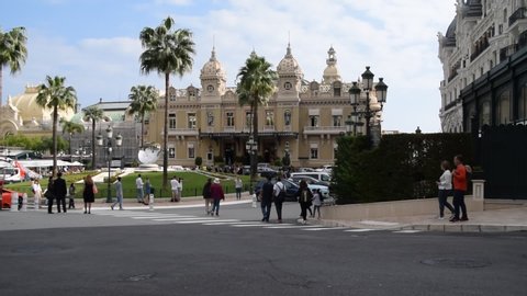 Monte Carlo / Monaco - October 30 2019: Casino Square daytime with cars and people scene