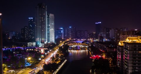 Aerial hyperlapse in the center of Chengdu with the view of the famous Anshun Lang Bridge and the Fuhe river