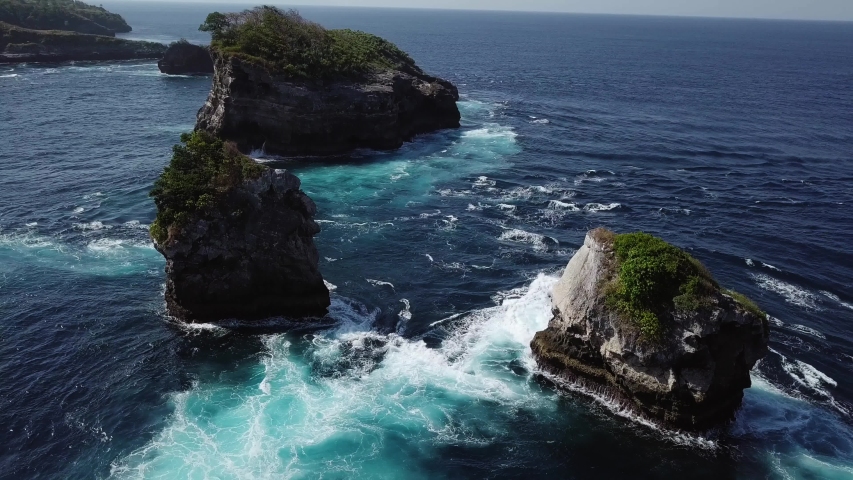 Small island covered with tropical rainforest