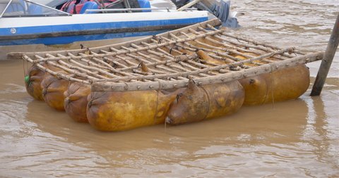 Sheepskin raft by the Yellow River in Lanzhou Gansu China